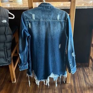 Distressed denim jacket. Tunic length like new
